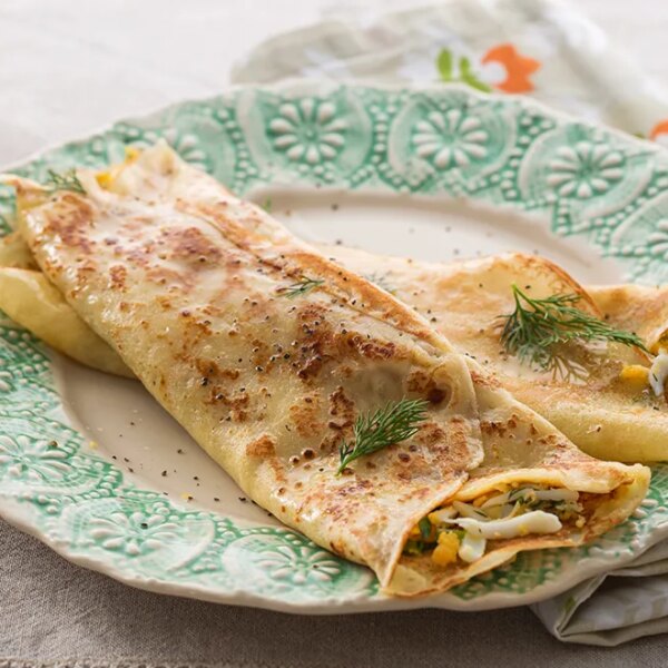 Головна 82 Ніжні млинці з сиром та яйцем: простий рецепт смачного сніданку