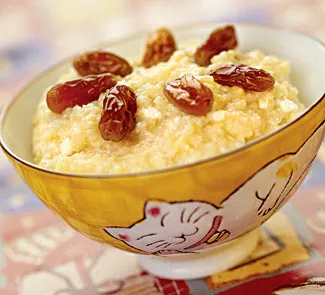 Ніжна пшоняна каша з сиром та родзинками: покроковий рецепт зі смаком дому 3