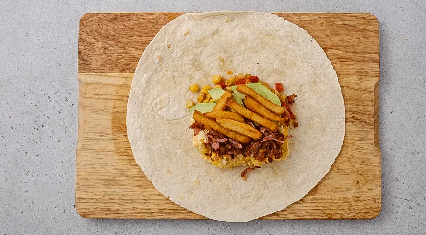 Ситно-солодка кукурудзяна тортилья з ніжним сиром та яйцем: поживний сніданок для бадьорого дня 4 Ситно-солодка кукурудзяна тортилья з ніжним сиром та яйцем: поживний сніданок для бадьорого дня 4