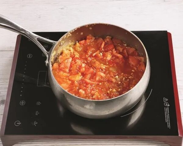 Ароматні кальмари, фаршировані рисом, запечені у духовці: покроковий рецепт з фото