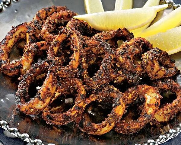 Хрусткі кільця кальмарів у кейджунській паніровці: покроковий рецепт із фото